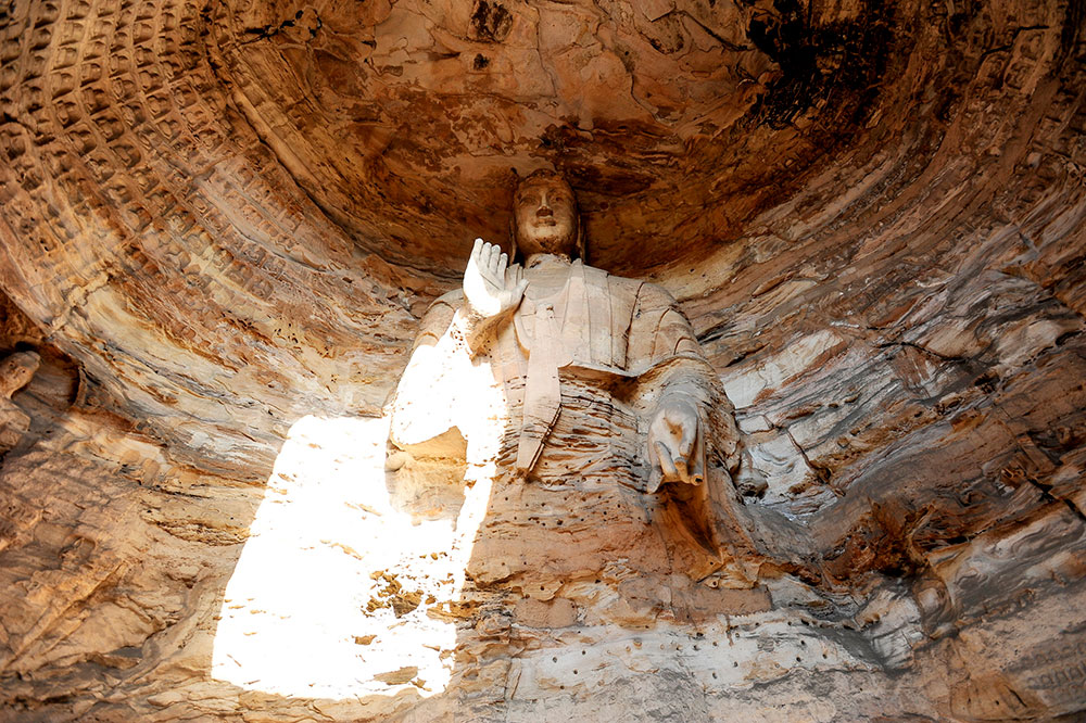 Estatua de buda de las grutas de Yungang en Datong, Shanxi. Foto: 123RF.